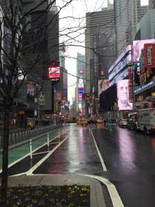 Photo by Christie Wisniewski. Edge of a rainy Times Square.